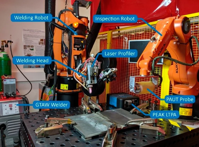 Robotic-Arm_-Laser-Source_-Control-System_-Welding-Torch_-and-Safety-Enclosure.