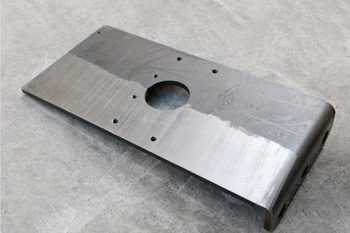 Laser cleaning of oil on metals