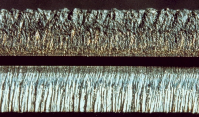 Dross or burrs on the bottom edge